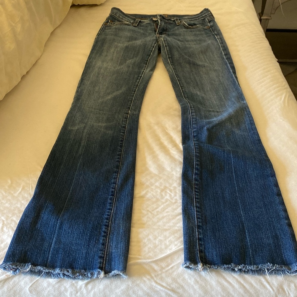 Women’s size 27 bootcut jeans with raw hems